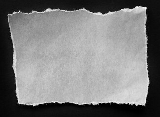 Torn paper on black