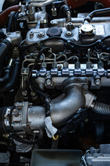 Fototapeta premium Detailed View of a Modern Diesel Truck Engine Bay with Fuel Lines and Hoses - Automotive Engineering, Vehicle Maintenance and Logistics Concept 1