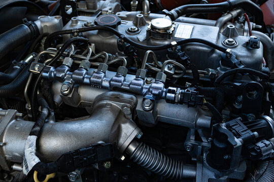 Detailed View of a Modern Diesel Truck Engine Bay with Fuel Lines and Hoses - Automotive Engineering, Vehicle Maintenance and Logistics Concept 2