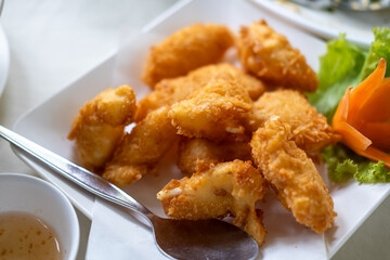 Fried shrimp served on plate with vegetable
