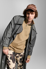 Stylish teenager showcasing trendy fashion with confidence and flair in a modern setting