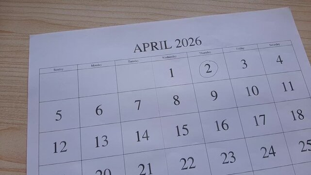 marking 2 April date on the calendar
