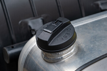 Fuel tank, large fuel tank for truck and car, plastic tank for cars, car repair parts, Fuel system of the tubes and pipes of the tractor or bulldozer or other construction machinery. © NastyaPhoto