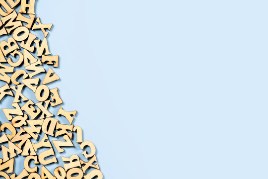English letters of the alphabet on blue background on the left side.