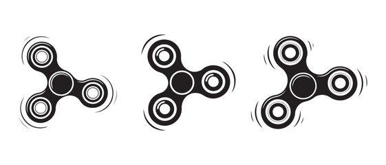 Spinning fidget toys in motion, isolated on white background.