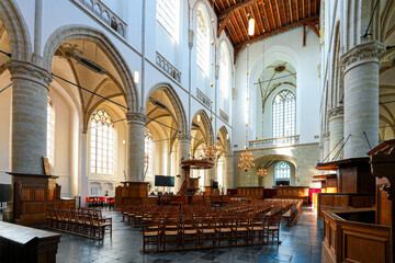 Obraz premium The grand gothic interior and wooden vaulted ceiling of St. Catharijnekerk in Brielle, South Holland, the Netherlands