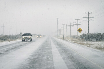 Winter Driving with Falling Snow Wintery Storm and Slick Driving