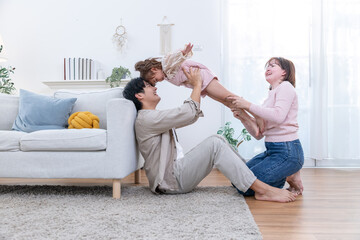 Family sharing joyful moments together in living room