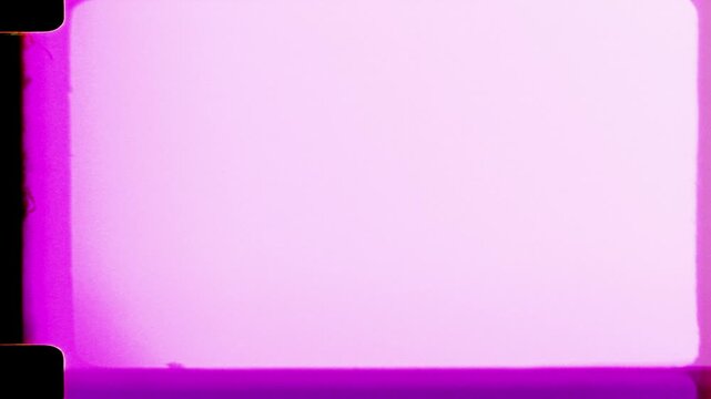 Analog film burn overlay with organic grain, subtle color bleed, and edge light leak texture for cinematic video editing