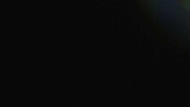 Elegant prism light leak overlay with chromatic aberration and soft rainbow lens flare effect for cinematic visuals