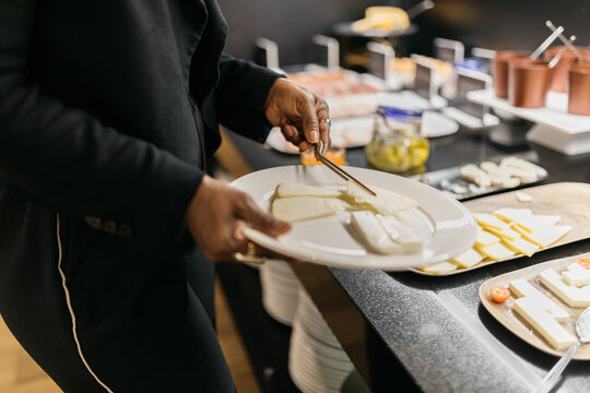 Hotel breakfast buffet with cheese and condiments