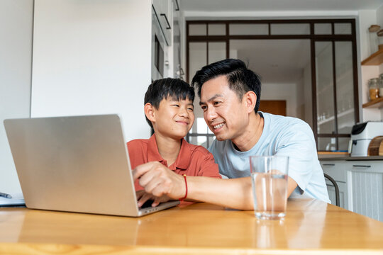 Chinese father and son enjoying bonding time