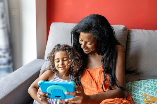 Mother and daughter enjoying digital time together