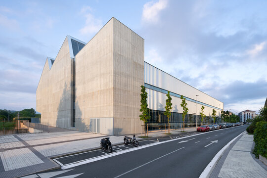 Brutalist sports complex with sleek modern design