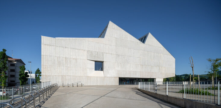 Brutalist sports complex with angular concrete design