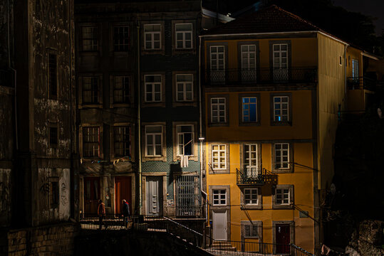 Colorful Houses in Porto at Night Illuminated by Street Lights