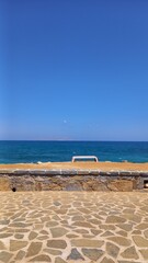 Fototapeta premium Blue ocean horizon with clear sky and copy space
