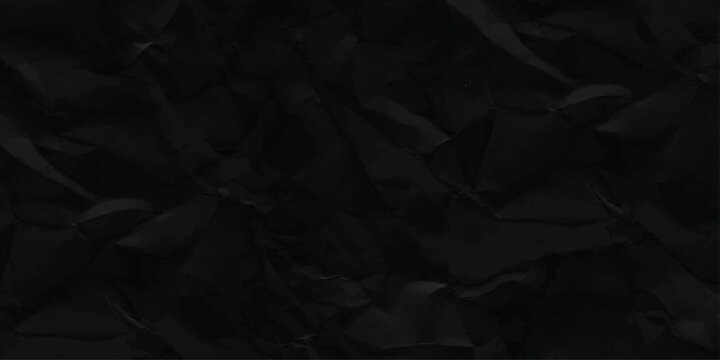 crumpled paper background. Black crumpled paper texture with folds, black background.