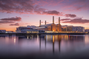The iconic Battersea Power Station taken during a beautiful sunset with a slack tide allowing for glorious reflections