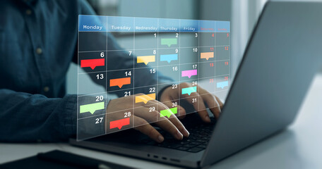 Project manager updating tasks and milestones progress planning with calendar interface for company.Business Project Management System.	
