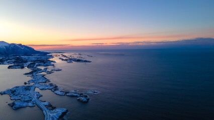 Fototapeta premium Atlantic Ocean Road in Norway winter landscape. The Atlantic Ocean Road with Storseisundet Bridge in winter (Nordmore, Norway).