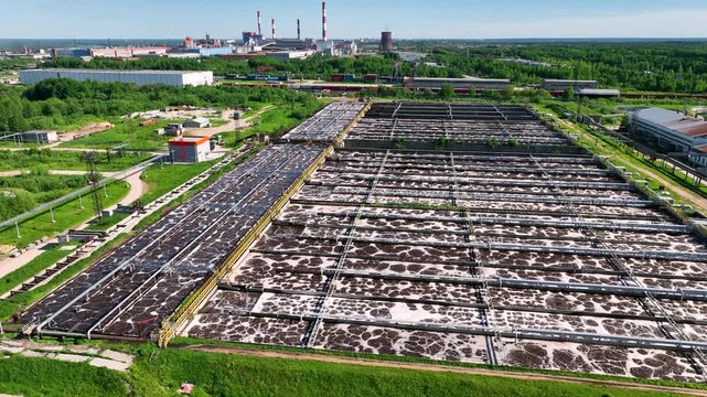 Wastewater treatment plants. Against the background of the enterprise. Quadcopter