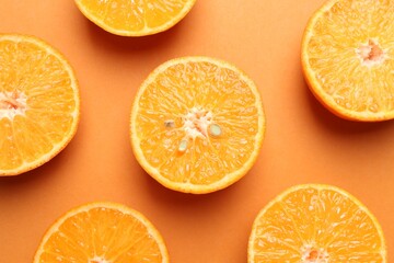 Fototapeta premium Fresh juicy tangerines on orange background, flat lay