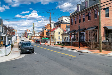historic residential street in a small American town, with traditional houses and a peaceful urban lifestyle. © kosoff
