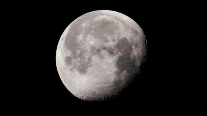 Fototapeta premium Close-up of the Moon's cratered surface with visible maria, set against the blackness of space. Concept Lunar Craters, Moon's Maria, Close-Up Moon, Space Photography, Astronomy