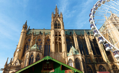 View on the beautiful illuminated cathedral in Metz at sunny day . The construction took three centuries to complete the cathedral, which was consecrated in 1552.