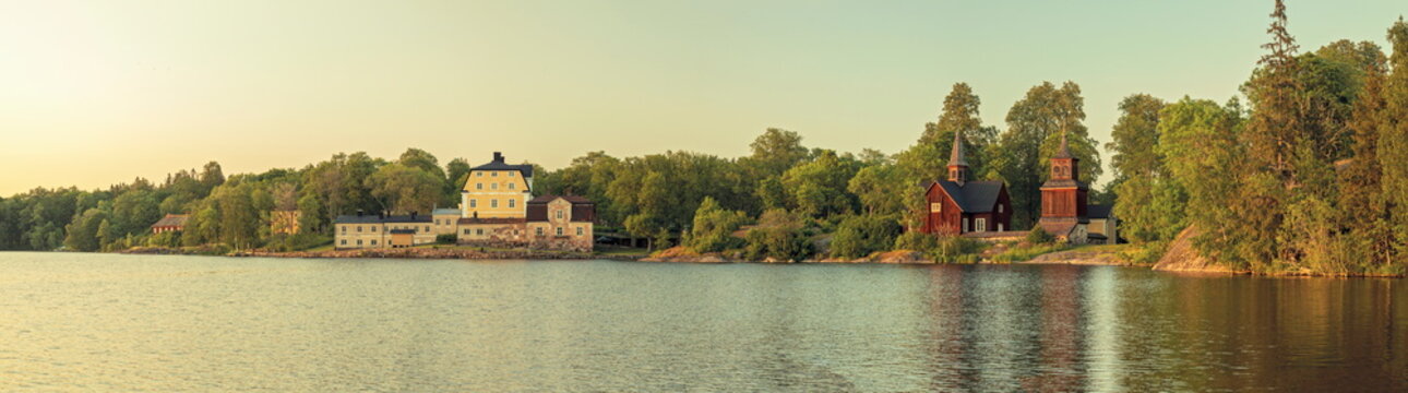Panoramic View of Fagervik Church and Manor at Sunset