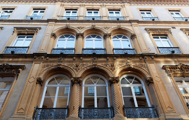 Street view and typical french buildings in the city of Metz, Lorraine region, France.