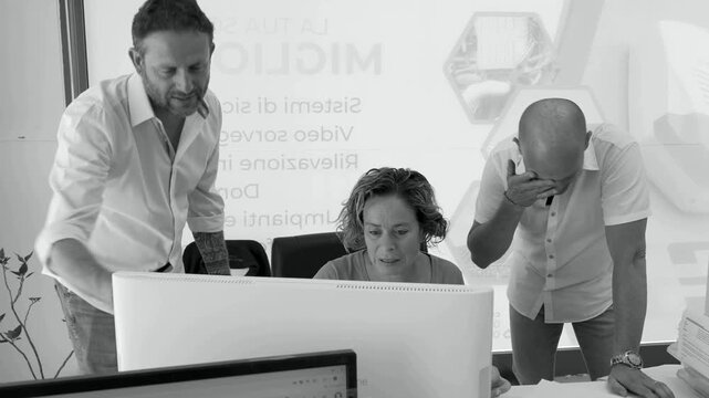 Employers and employees working together in modern office collaborative environment