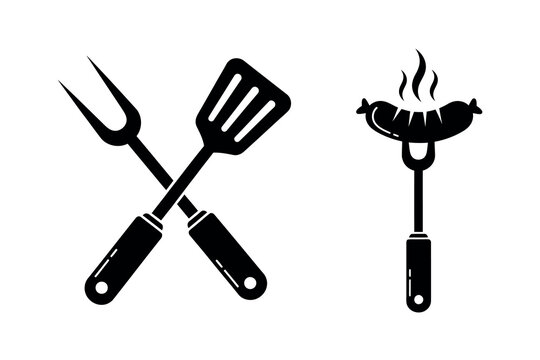 Black silhouette of crossed barbecue tools and a sausage on a fork