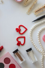 Various accessories and beauty products on white background. Coquette aesthetic. Flat lay.