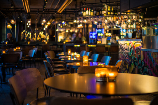 Cozy and Ambient Restaurant Interior with Warm Lighting and Elegant Decor Creating a Relaxing and Inviting Atmosphere for a Perfect Dining Experience