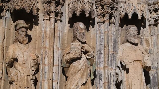 Historic Gothic Entry to Morella Cathedral with Sculptures of Apostles
