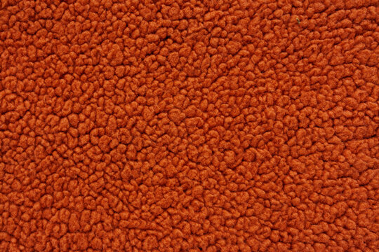 Rust orange fleece fabric texture for cozy blankets and creative sewing