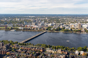 Obraz premium Panoramic aerial view of the Charles River with the Harvard Bridge connecting Boston and Cambridge in Massachusetts, USA
