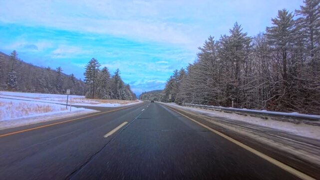 Blue skies clearing up after a heavy winter snow storm New Hampshire 2026