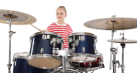 Little girl learning how to play drums on white background