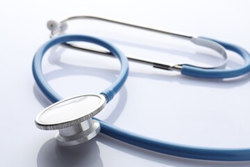 One stethoscope on white background, closeup. Medical tool