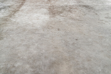 Obraz premium Ice covered ground surface with wet frozen texture outdoors. Close up photography. Winter slippery road and frost concept. Design for wallpaper, poster, banner, header.