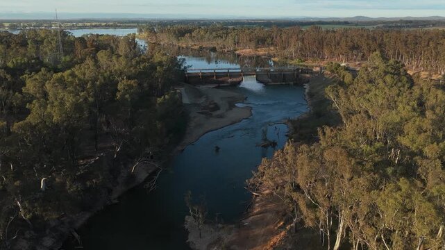 Aerial footage showcasing flowing water and lush surroundings
