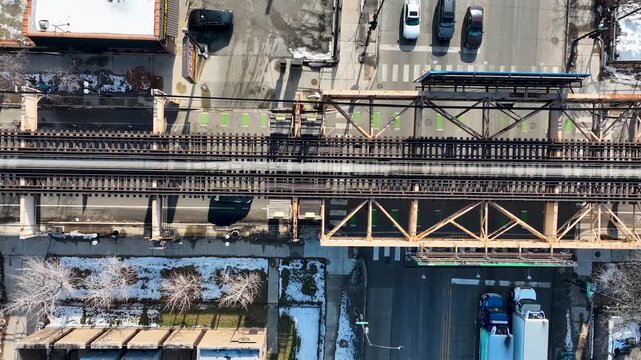 Cinematic 4K Drone Aerial Chicago West Side Flying Over CTA Green Line 'L' Train Tracks in Garfield Park