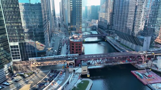 Drone Flying Between Downtown Chicago River Skyscrapers, Sunny Winter Afternoon Aerial of The Loop, Cinematic 4K