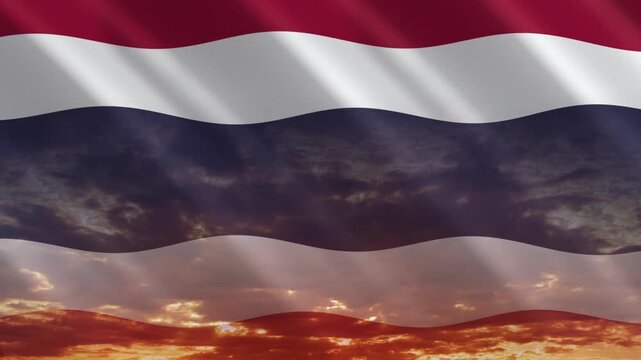 Flag of Thailand waving against a vibrant sunset, creating a patriotic and inspiring atmosphere with warm tones.