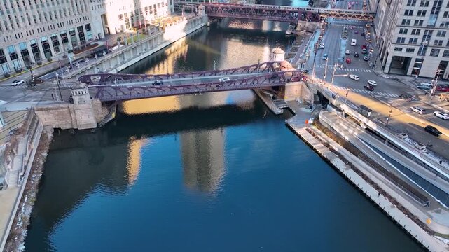 Drone Flying Between Downtown Chicago River Skyscrapers, Sunny Winter Afternoon Aerial of The Loop, Cinematic 4K