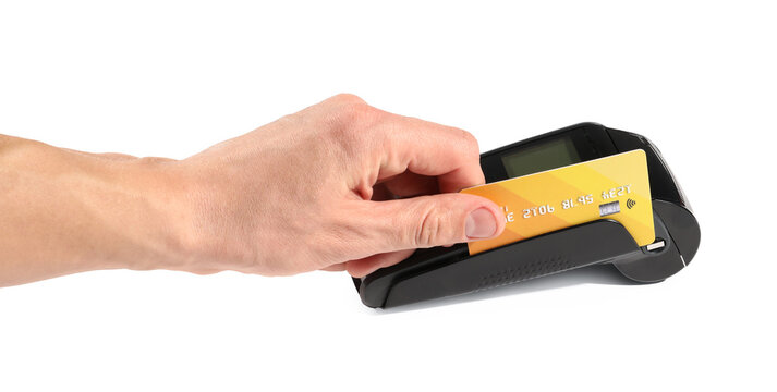 Man with credit card using payment terminal on white background, closeup
