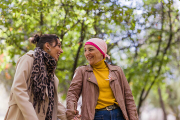Fototapeta premium Mother and daughter enjoying life after cancer